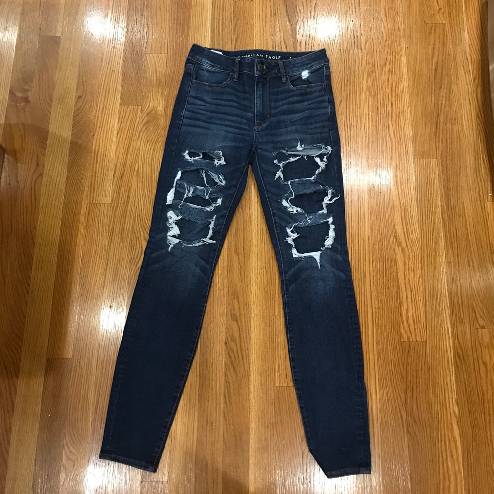Dark wash patched denim skinny jeans